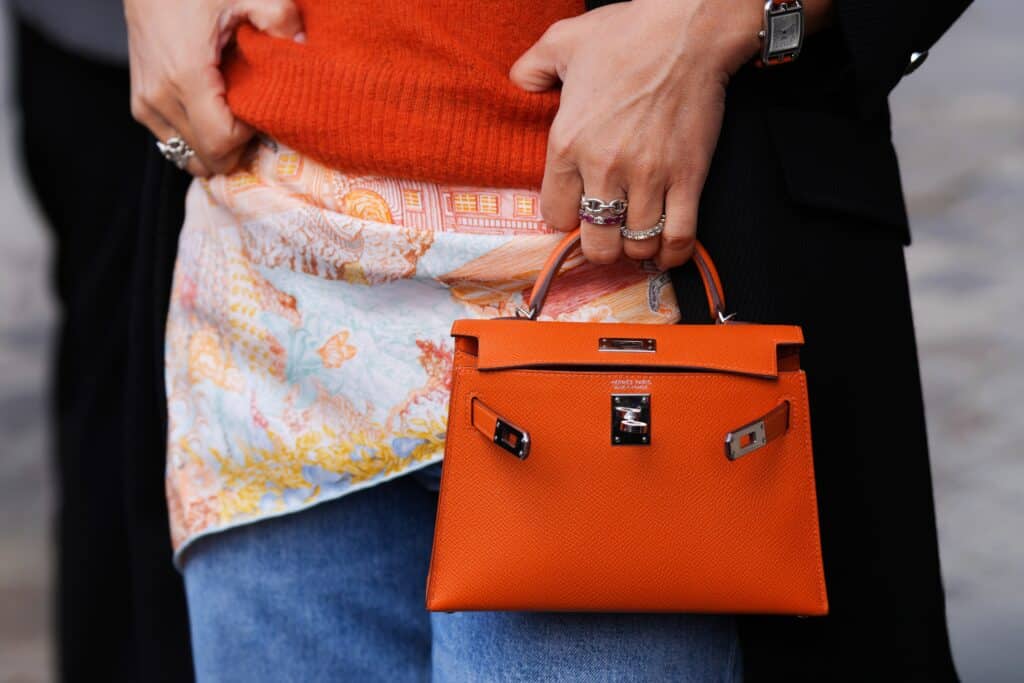 Paris,,france, ,october,,4,,2025:,woman,wears,hermes,orange