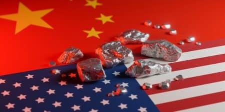 Rare,earth,metallic,nuggets,on,split,china,usa,flags.,symbolizes